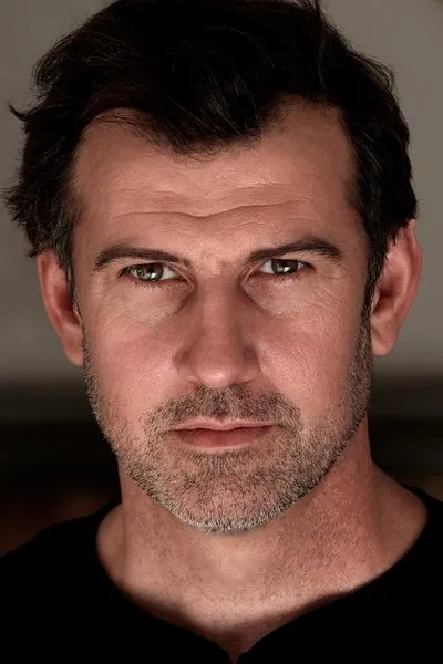 Mark L. Colbenson